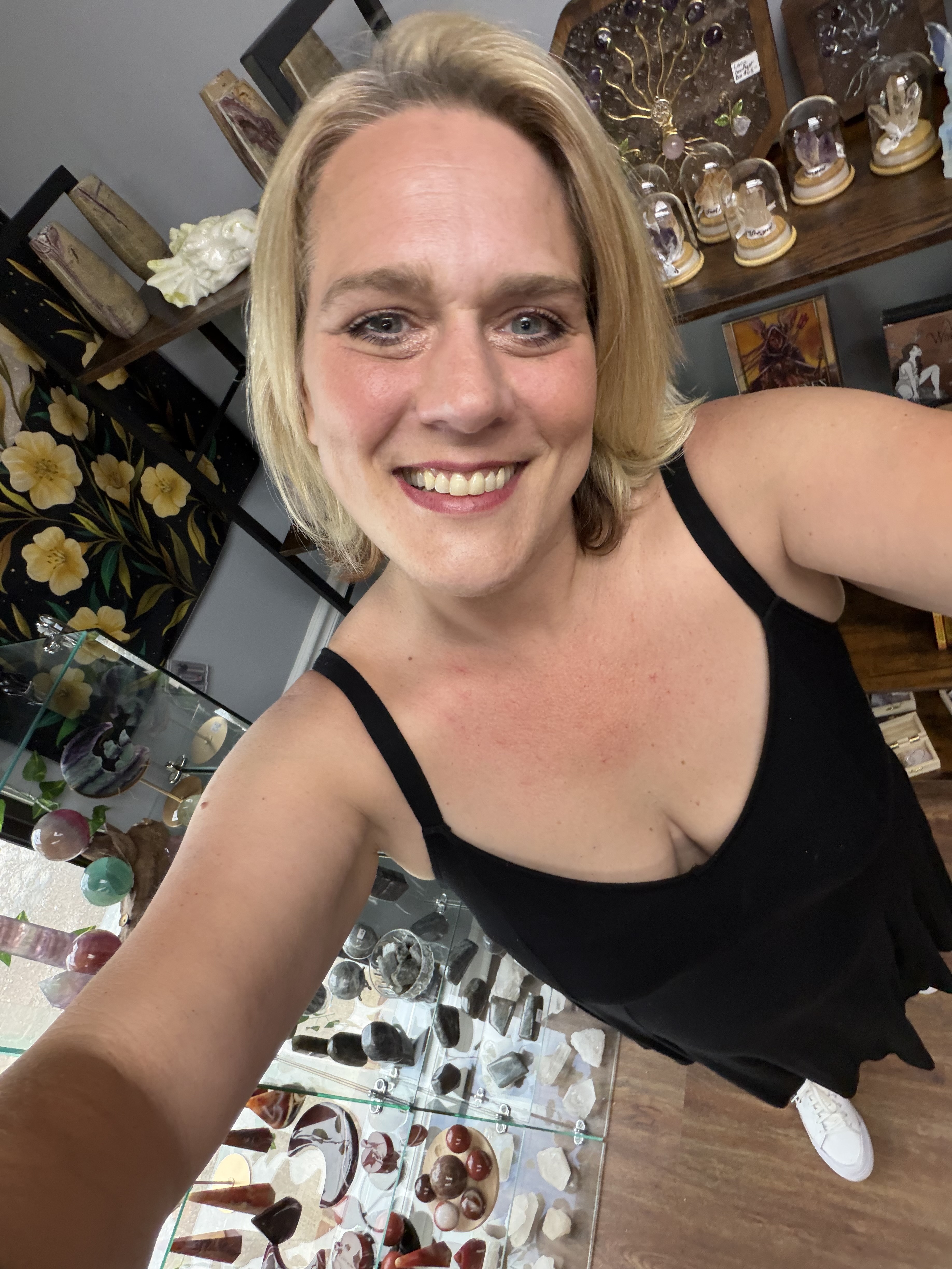 Brandy Jovingo, owner of Lead Me Through The Woods, in the crystal room at Mystic Nook